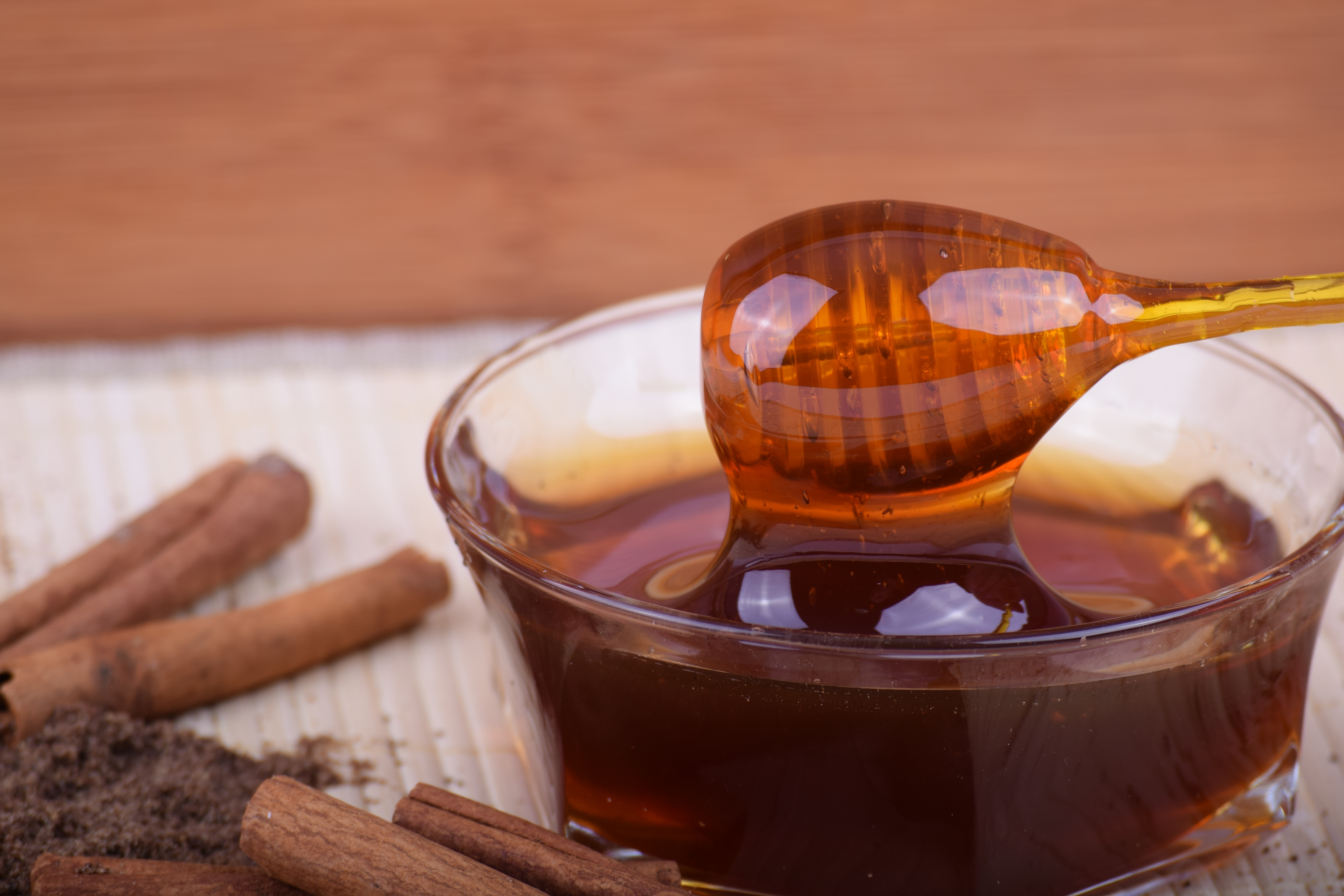Photo of Honey, dipper (spool) wood, and a bowl. Rosh HaShana. (Photo by Exploerebob/pixabay).