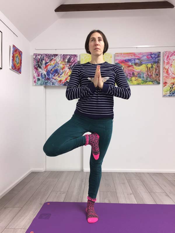 Yoga teacher Natalie Dekel, Tree posture. Yoga classes in Southampton.