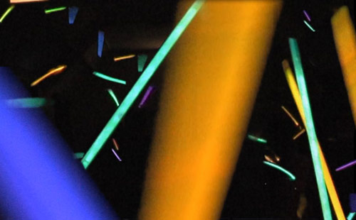 Children playing with glow sticks. A great way to end up a Hanukkah party. Photo © Gil Dekel.‎