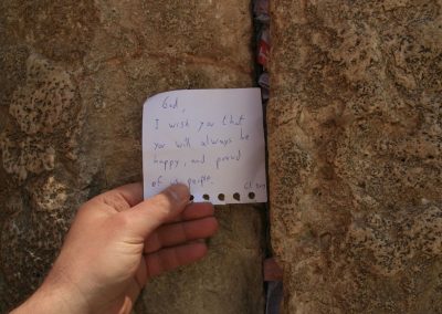 For thousands years people place notes with prayers between the stones of the Western Wall. Here is my note (sending good wishes to God...) Jerusalem, Israel. (Photo: Gil Dekel, 2019).