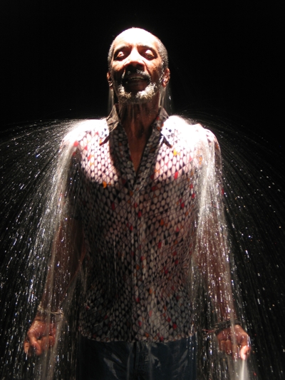 Figure 50: Bill Viola, Ocean Without a Shore, 2007, High Definition video triptych, two 65” plasma screens, one 103” screen mounted vertically, six loudspeakers (three pairs stereo sound). Room dimensions variable, Production still (performer Darrow Igus). Photo: Kira Perov.