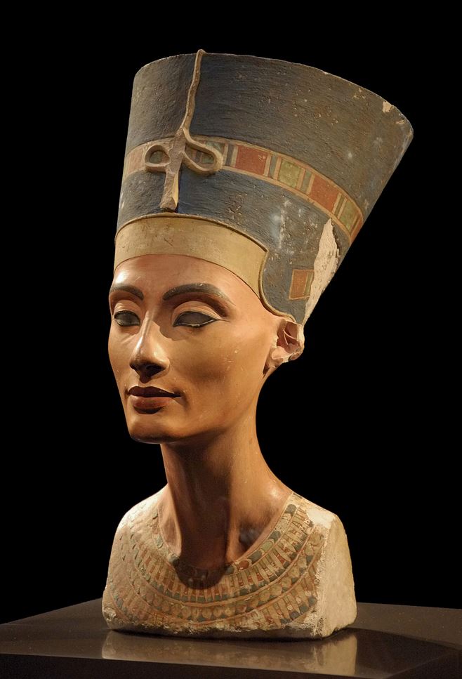 Nefertiti bust, 18th Dynasty, ca. 1351–1334 BC. Height: 49 cm, width: 24.5 cm, depth: 35 cm. Material: limestone, painted stucco, quartz, wax. Date found: 6 December 1912. Egyptian Museum and Papyrus Collection, Neues Museum, Berlin. Photo: Philip Pikart, via Wikipedia. Creative Commons.